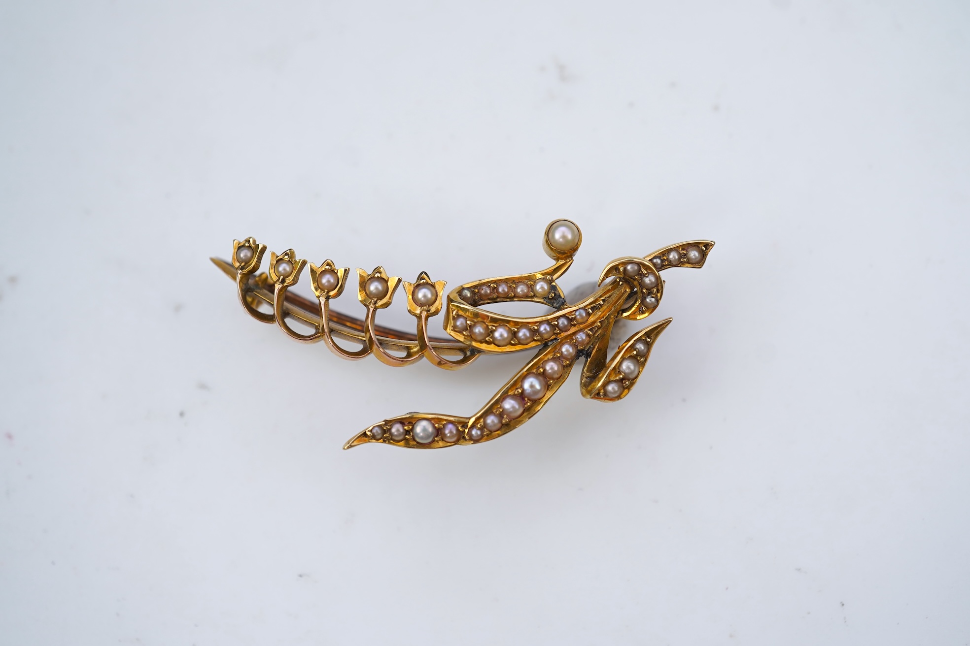 An Edwardian gold and seed pearl brooch, early 20th century